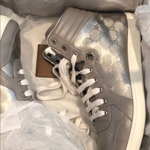 Gucci Men’s hightop sneaker; silver GG